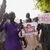 Menschen mit Plakaten des Putschisten General Omar Tchiani  
in Niamey. - Foto: Sam Mednick/AP/dpa