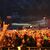 Metal-Fans feiern während eines Konzerts auf dem Festivalgelände. - Foto: Christian Charisius/dpa
