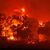 Das Feuer verbrennt ein Haus im Dorf in der Nähe der Stadt Alexandroupolis in der nordöstlichen Region Evros. Stürmische Winde fachen die Flammen der Waldbrände in ganz Griechenland an. - Foto: Achilleas Chiras/AP