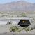 Geschützt von einem Hitzeschild und gebremst von Fallschirmen landete die Kapsel in der Wüste des US-Bundesstaats Utah. - Foto: Keegan Barber/Nasa/Zuma Press/dpa