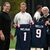 Julian Nagelsmann und Rudi Völler mit Trikots der New England Patriots. - Foto: Federico Gambarini/dpa