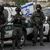 Israelische Grenzpolizisten stehen während der Freitagsgebete vor der Altstadt Jerusalems. - Foto: Mahmoud illean/AP/dpa