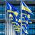 Europäische und ukrainische Flaggen wehen vor dem Europäischen Parlament in Straßburg. Die EU-Kommission erklärt die positive Empfehlung für das osteuropäische Land damit, dass die noch ausstehenden Reformen bereits auf den Weg gebracht seien. - Foto: Pascal Bastien/AP/dpa