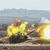Die israelischen Streitkräfte feuern Artilleriegranaten auf den Gazastreifen ab. - Foto: Ilia yefimovich/dpa