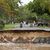 Zerstörte Straße im australischen Cairns, die von den Regenmassen des Tropensturms «Jasper» weggespült wurde. - Foto: Joshua Prieto/AAP/dpa