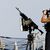 Ein US-Soldat steht auf einem Kriegsschiff der US-Marine. Die USA reagieren mit einer neuen Allianz auf die Angriffe der Huthi-Rebellen auf Frachtschiffe. (Archivbild) - Foto: -/Informationstechniker 2.Klasse Ruskin Naval/US Navy/AP/dpa