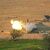 Eine mobile israelische Artillerieeinheit feuert eine Granate aus dem Süden Israels in Richtung des Gazastreifens ab. - Foto: Ohad Zwigenberg/AP/dpa