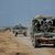 Israelische Streitkräfte bewegen sich in der Nähe der Grenze zum Gazastreifen. - Foto: Ohad Zwigenberg/AP/dpa