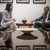 Außenministerin Annalena Baerbock unterhält sich mit dem jordanischen Außenminister Aiman al-Safadi. - Foto: Michael Kappeler/dpa