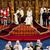 Charles III sitzt neben Camilla während der Eröffnung des Parlaments im Palace of Westminster. - Foto: Kirsty Wigglesworth/AP Pool/AP