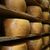 Mehrere Laibe des Hartkäses Gran Moravia liegen in einem Lager der Brazzale AG. Das Unternehmen ist für Butter und Käse bekannt. - Foto: Brazzale AG/dpa