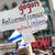 Ein Teilnehmer der Kundgebung «Allianz gegen Antisemitismus ruft zur Solidarität mit Israel auf». Die Zahl der antisemitisch motivierten Straftaten ist in den vergangenen Monaten enorm angestiegen. - Foto: Thomas Banneyer/dpa
