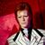 Nur aus Wachs - aber der «Mullet» sitzt: Die Figur von David Bowie/Ziggy Stadust bei Madame Tussauds in Berlin trägt Vokuhila. - Foto: Britta Pedersen/dpa-Zentralbild/dpa