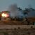 Eine israelische Panzerhaubitze feuert eine Granate ab. - Foto: Jamal Awad/Xinhua/dpa