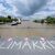 Jemand hat in Regensburg das Wort «Klimakrise» auf eine Brücke über der Donau geschrieben. - Foto: Sven Hoppe/dpa