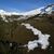 Blick auf eine Talabfahrt aus Kunstschnee. Viele Urlauber fahren zum Skifahren oder zum Wandern in die Schweiz (Archivbild). - Foto: Gian Ehrenzeller/Keystone/dpa