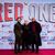 Chris Evans (l-r), J.K. Simmons und Dwayne Johnson auf dem Roten Teppich zur Weltpremiere des Films «Red One – Alarmstufe Weihnachten».  - Foto: Christoph Soeder/dpa