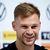 Joshua Kimmich und das DFB-Logo mit den vier Weltmeister-Sternen. Der WM-Titel fehlt dem Kapitän noch. - Foto: Federico Gambarini/dpa