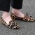 Auch Schuhe können Leo-Look - diese hier gehören der früheren britischen Premierministerin Theresa May. (Foto von 2017) - Foto: picture alliance / Scott Heppell/PA Wire/dpa