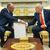 Merz übergab das Gastgeschenk im Oval Office.  - Foto: Evan Vucci/AP/dpa