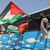 Aktivisten wollen am Grenzübergang Rafah gegen Israels Angriffe im Gazastreifen protestieren. - Foto: Yousef Murad/AP/dpa