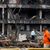 Teile eines Air India-Flugzeugs, das am Donnerstag abgestürzt ist, sind auf einem Gebäude in Ahmedabad, Indien, zu sehen.  - Foto: Rafiq Maqbool/AP/dpa