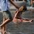 Die Schulen in Italien haben im Sommer über Wochen geschlossen - nicht allen gefällt das. (Archivbild) - Foto: Luca Bruno/AP/dpa