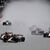 Regen und eine nasse Piste sorgen in Silverstone für Chaos. - Foto: Darko Bandic/AP/dpa