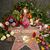 Blumen liegen um den Stern für Ozzy Osbourne auf dem Hollywood Walk of Fame. - Foto: Damian Dovarganes/AP/dpa