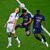 Die beiden PSG-Spieler Desire Doué (M) und Nuno Mendes bedrängen Tottenhams Joao Palhinha (l). Palhinha kam in diesem Sommer vom FC Bayern München. - Foto: Denes Erdos/AP/dpa