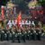 Die rote Nationalflagge mit gelbem Stern war allgegenwärtig. - Foto: Luong Thai Linh/Pool EPA/AP/dpa